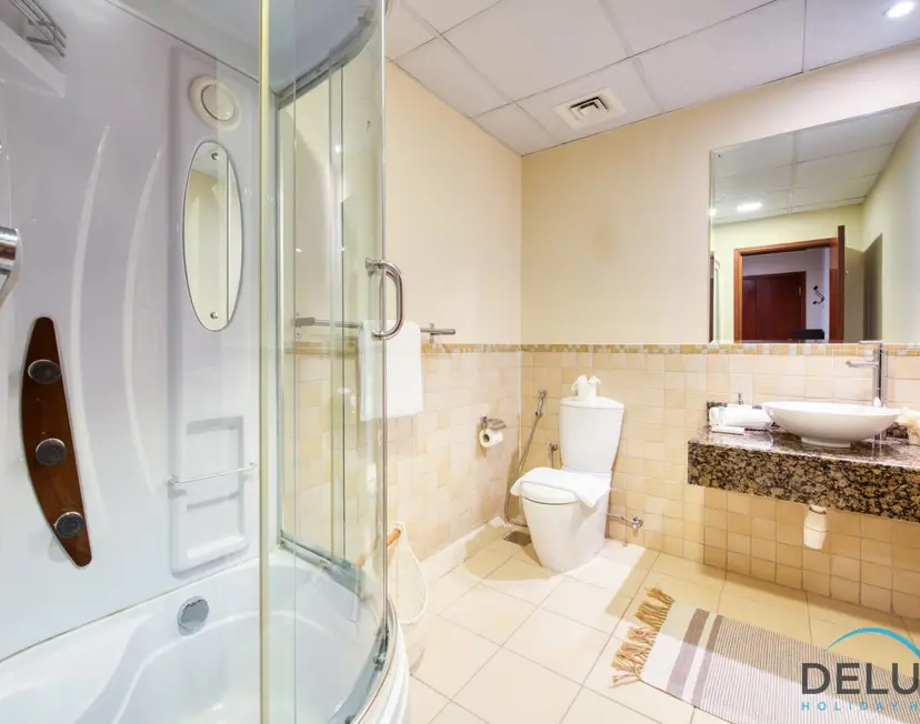 High-floor 1-Bedroom Unit Close to Beach w/ Sea Views — Sadaf — photo 35